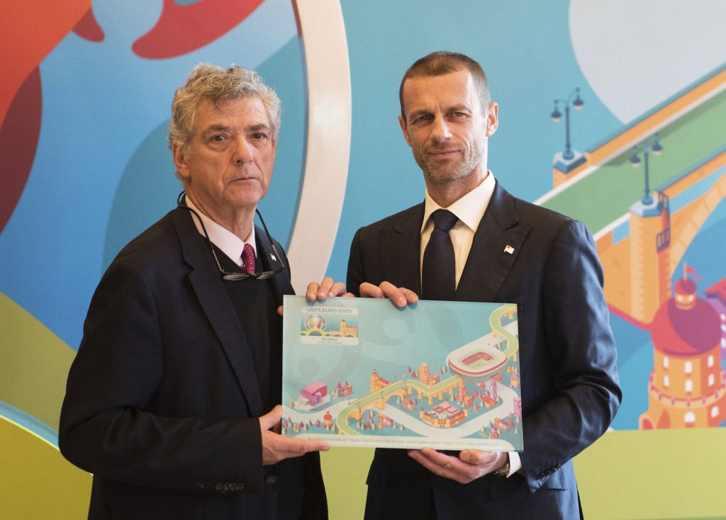 UEFA president Aleksander Ceferin (R) and president of the Royal Spanish Football Federation (RFEF) and UEFA vice-president Angel Maria Villar (L) pose for photographers during the launch of the Bilbao's logo for the EURO 2020 UEFA European Championship football tournament in the Spanish Basque city of Bilbao on December 15, 2016. The EURO 2020 UEFA European Championship will be held in thirteen cities in thirteen different European countries during the summer of 2020, with the semi-finals and final staged at Wembley stadium in London on July 2020. / AFP / ANDER GILLENEA        (Photo credit should read ANDER GILLENEA/AFP/Getty Images)