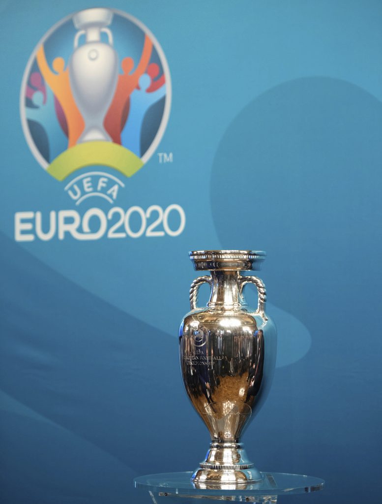 A picture taken on December 15, 2016 shows the EURO 2020 UEFA European Championship trophy during the launch of the Bilbao's logo for the EURO 2020 UEFA European Championship football tournament in the Spanish Basque city of Bilbao. The EURO 2020 UEFA European Championship will be held in thirteen cities in thirteen different European countries during the summer of 2020, with the semi-finals and final staged at Wembley stadium in London on July 2020. / AFP / ANDER GILLENEA        (Photo credit should read ANDER GILLENEA/AFP/Getty Images)